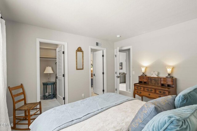 2113 Doral Ct, Oxnard, CA 93036 - bedroom with a closet, light carpet, visible vents, and a spacious closet