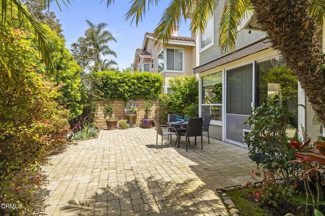 2113 Doral Ct, Oxnard, CA 93036 - view of patio with outdoor dining area and fence