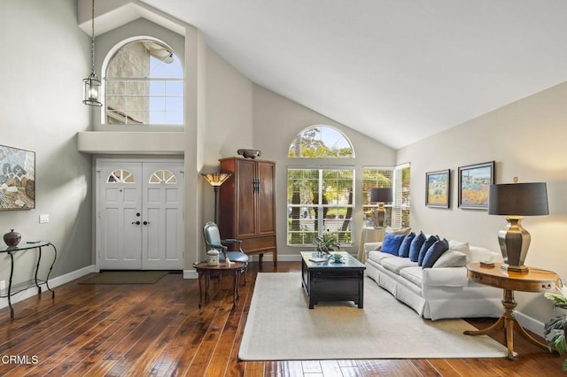 2113 Doral Ct, Oxnard, CA 93036 - living room with baseboards, dark wood-style flooring, and high vaulted ceiling