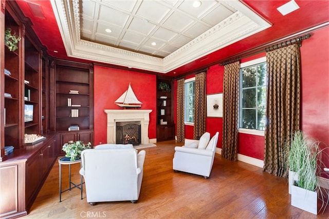 19 Fox Hole Rd, Ladera Ranch, CA 92694 - living room with crown molding, light wood finished floors, a lit fireplace, and recessed lighting