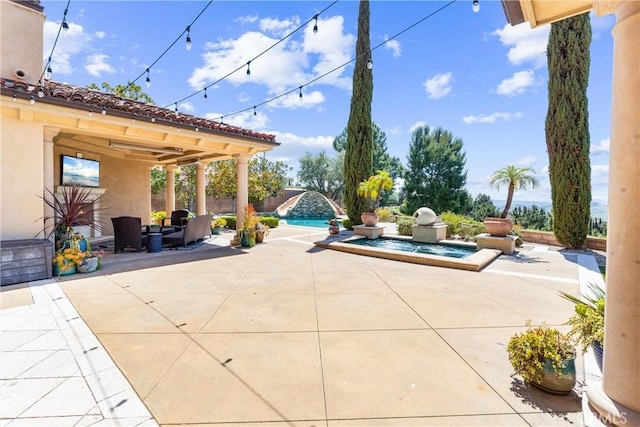 view of patio featuring an outdoor pool