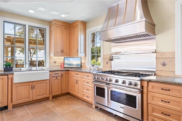 19 Fox Hole Rd, Ladera Ranch, CA 92694 - kitchen featuring premium range hood, range with two ovens, light brown cabinets, backsplash, and recessed lighting