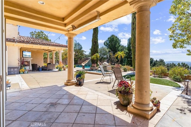 view of patio / terrace with an outdoor pool