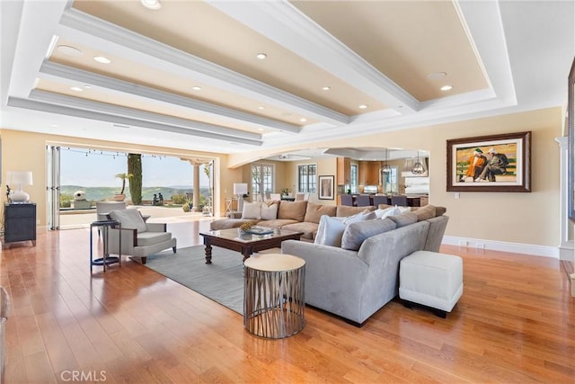 19 Fox Hole Rd, Ladera Ranch, CA 92694 - living room with light wood-style flooring, ornamental molding, and recessed lighting