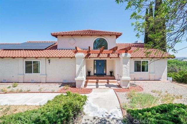 2322 Almond Springs Dr, Paso Robles, CA 93446 - mediterranean / spanish-style home with roof mounted solar panels, stucco siding, and a tiled roof