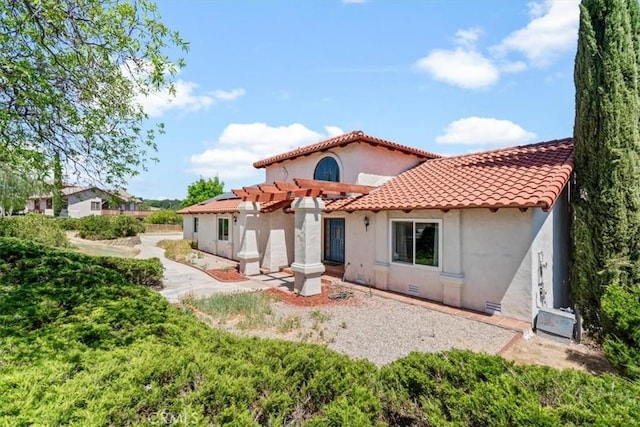 2322 Almond Springs Dr, Paso Robles, CA 93446 - rear view of property featuring stucco siding, a pergola, and a tiled roof