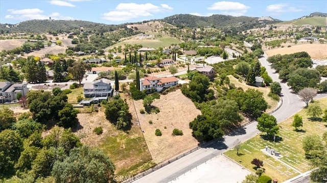 aerial perspective of suburban area featuring a mountainous background