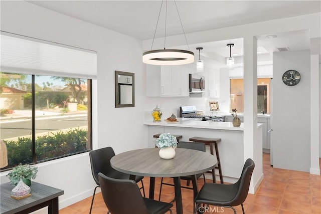 1 Valencia Dr, Rancho Mirage, CA 92270 - dining room with light tile patterned floors