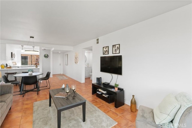 1 Valencia Dr, Rancho Mirage, CA 92270 - living room with light tile patterned flooring and baseboards