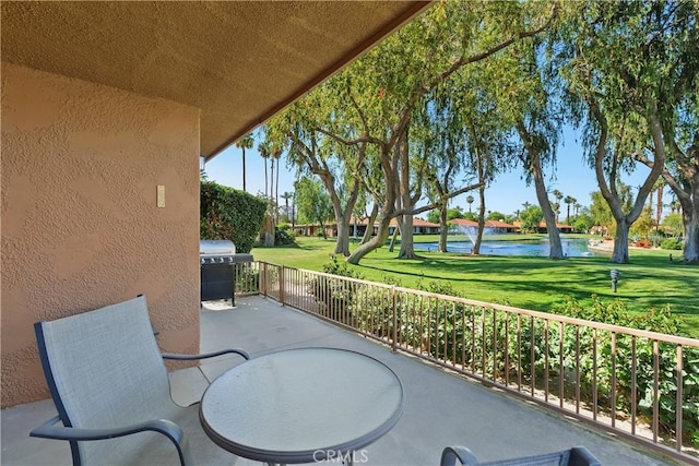 1 Valencia Dr, Rancho Mirage, CA 92270 - view of patio / terrace featuring a water view and area for grilling