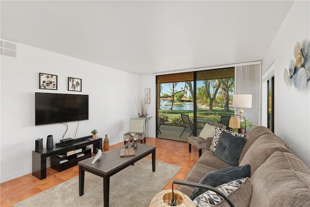 1 Valencia Dr, Rancho Mirage, CA 92270 - living room featuring a wall of windows and light tile patterned floors
