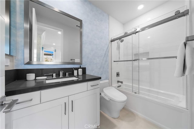 100 Bellatrix, Irvine, CA 92618 - bathroom featuring vanity, toilet, bath / shower combo with glass door, and wallpapered walls