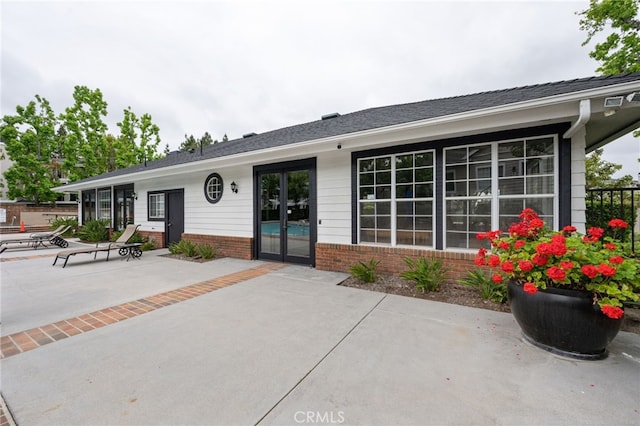 23412 Pacific Park Dr Unit 40H, Aliso Viejo, CA 92656 - exterior space featuring a patio area and brick siding