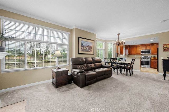 23412 Pacific Park Dr Unit 40H, Aliso Viejo, CA 92656 - living room with a chandelier, light carpet, ornamental molding, and baseboards