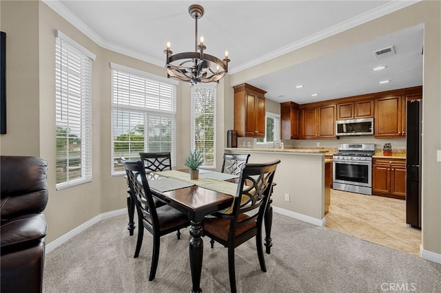 23412 Pacific Park Dr Unit 40H, Aliso Viejo, CA 92656 - dining room with a chandelier, light carpet, ornamental molding, baseboards, and recessed lighting