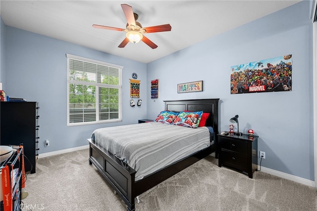 23412 Pacific Park Dr Unit 40H, Aliso Viejo, CA 92656 - bedroom with light carpet, baseboards, and a ceiling fan