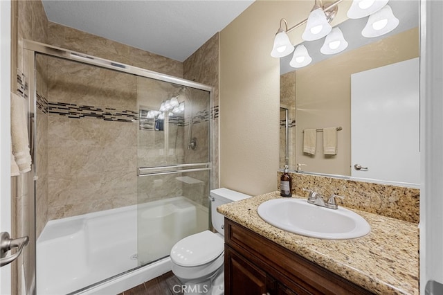 23412 Pacific Park Dr Unit 40H, Aliso Viejo, CA 92656 - bathroom with a shower stall, toilet, vanity, and wood finished floors