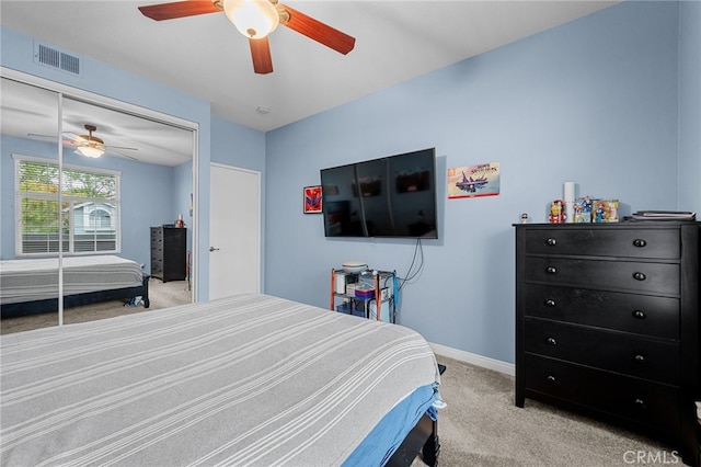 23412 Pacific Park Dr Unit 40H, Aliso Viejo, CA 92656 - bedroom with light colored carpet, a closet, baseboards, and a ceiling fan