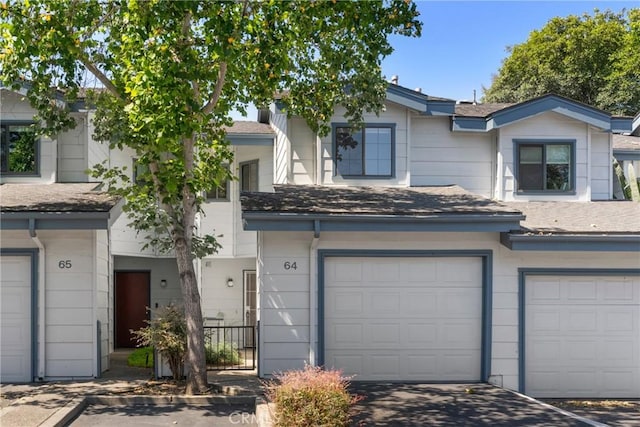 2220 Exposition Dr Unit 64, San Luis Obispo, CA 93401 - view of property with a garage and driveway