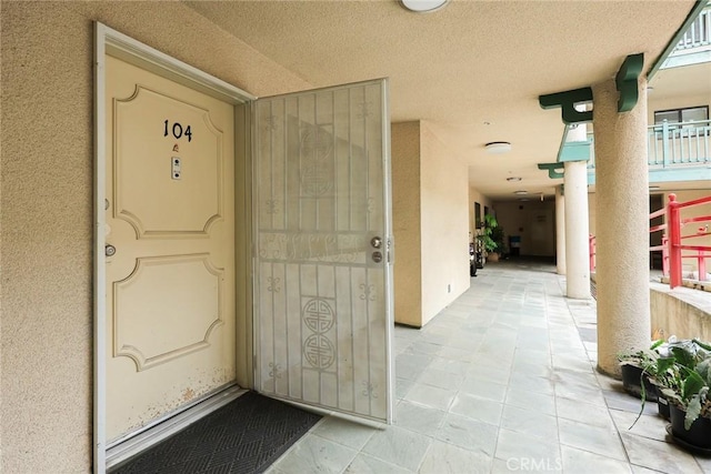 321 N Orange Unit 104, Monterey Park, CA 91755 - doorway to property with stucco siding