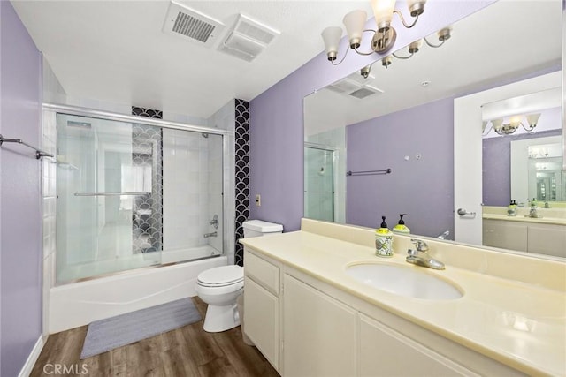 321 N Orange Unit 104, Monterey Park, CA 91755 - full bathroom featuring toilet, a notable chandelier, visible vents, and wood finished floors