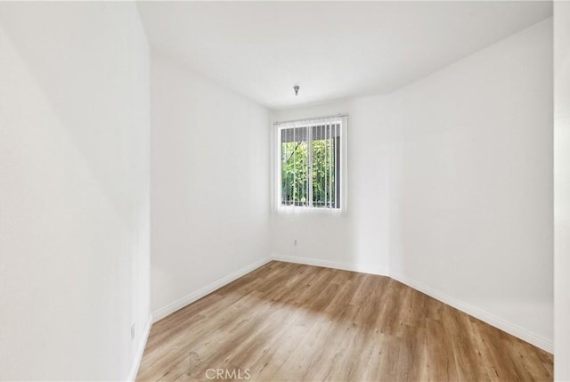 1450 Brett Pl Unit 205, San Pedro, CA 90732 - spare room featuring baseboards and wood finished floors