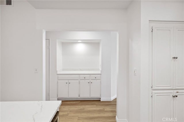 1450 Brett Pl Unit 205, San Pedro, CA 90732 - hallway with light wood-style floors, visible vents, and baseboards