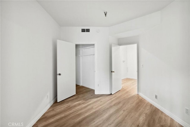 1450 Brett Pl Unit 205, San Pedro, CA 90732 - unfurnished bedroom featuring light wood-type flooring and a closet