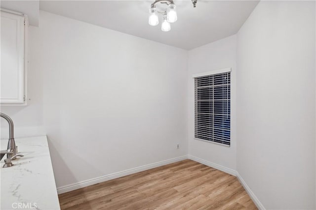 1450 Brett Pl Unit 205, San Pedro, CA 90732 - unfurnished dining area with light wood-type flooring