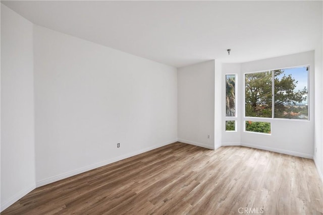 1450 Brett Pl Unit 205, San Pedro, CA 90732 - unfurnished room with wood finished floors and baseboards