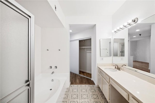 1450 Brett Pl Unit 205, San Pedro, CA 90732 - full bath featuring a spacious closet, vanity, recessed lighting, and a bath