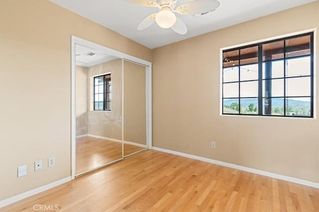 770 Roads End, Lebec, CA 93243 - unfurnished bedroom featuring wood finished floors, a closet, visible vents, baseboards, and ceiling fan