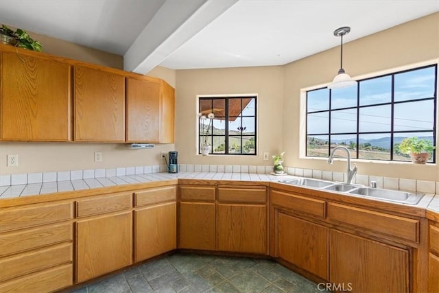 770 Roads End, Lebec, CA 93243 - kitchen featuring a sink, brown cabinetry, pendant lighting, and tile counters