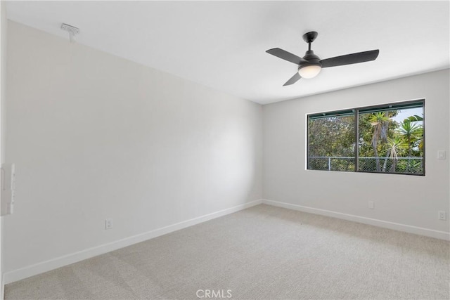 2918 Los Campos Dr, Fallbrook, CA 92028 - spare room with baseboards, light carpet, and a ceiling fan
