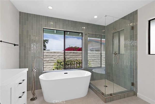 2918 Los Campos Dr, Fallbrook, CA 92028 - bathroom featuring a freestanding tub, a shower stall, recessed lighting, tile patterned floors, and vanity