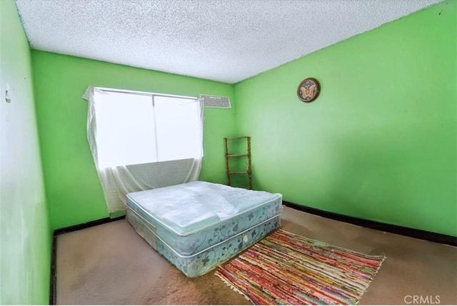 866 W Alondra Blvd, Compton, CA 90220 - bedroom featuring a textured ceiling, carpet flooring, and baseboards