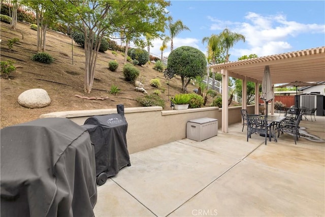 view of patio / terrace featuring outdoor dining area, a pergola, grilling area, and fence