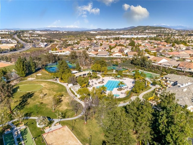 birds eye view of property featuring a mountain view and a residential view