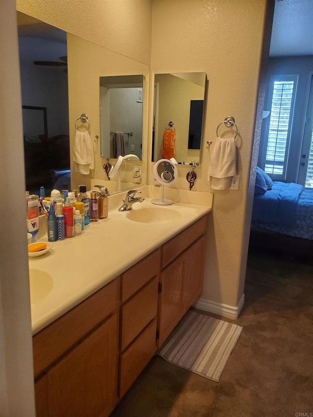 3259 Dehesa Rd Unit 57, El Cajon, CA 92019 - ensuite bathroom with double vanity and baseboards