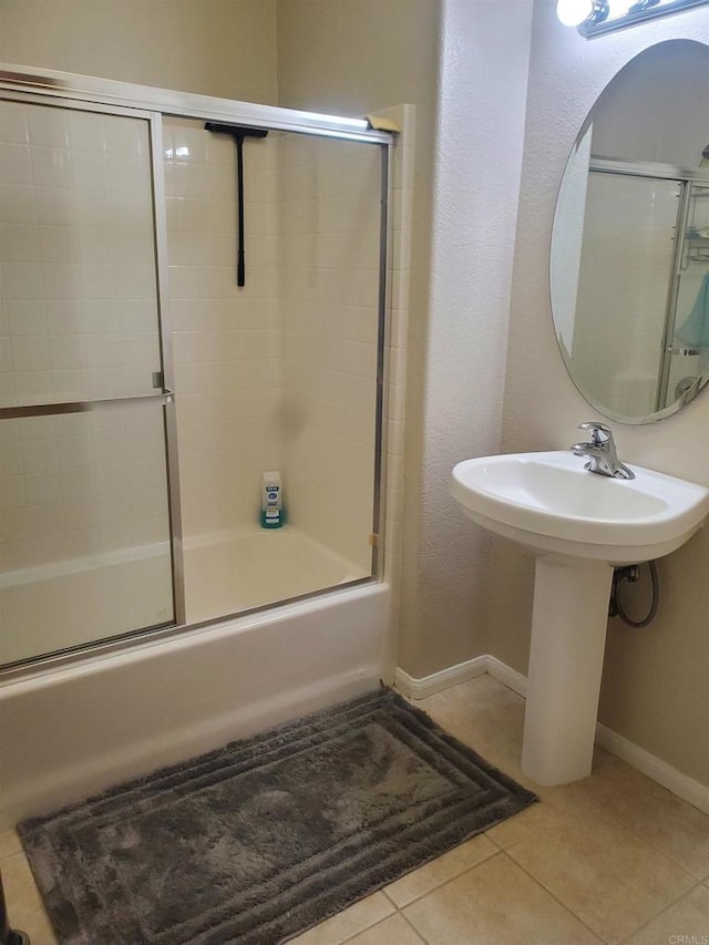 3259 Dehesa Rd Unit 57, El Cajon, CA 92019 - full bathroom with shower / bath combination with glass door, tile patterned flooring, and baseboards