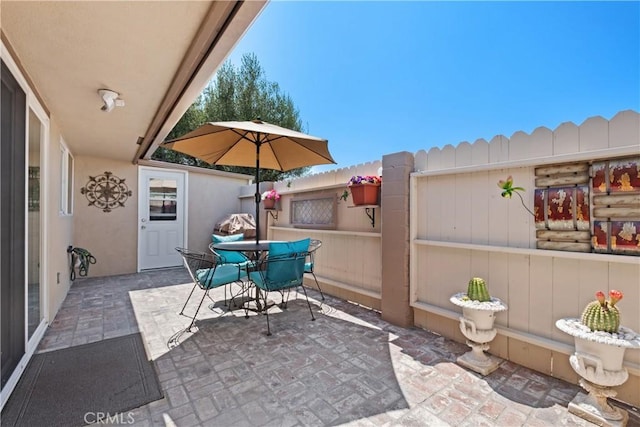 27071 Calle Caballero Unit B, San Juan Capistrano, CA 92675 - view of patio / terrace featuring fence and outdoor dining area