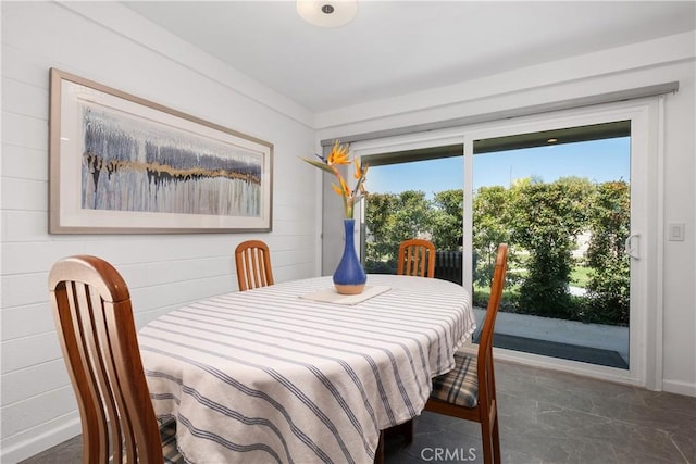 dining room featuring baseboards