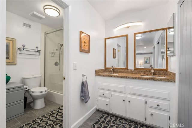 27071 Calle Caballero Unit B, San Juan Capistrano, CA 92675 - full bath with an enclosed shower, toilet, double vanity, and tile patterned floors