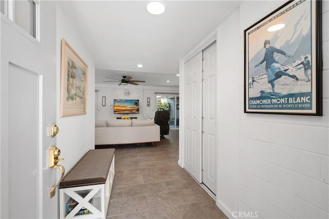 27071 Calle Caballero Unit B, San Juan Capistrano, CA 92675 - hallway featuring recessed lighting and stone finish floors