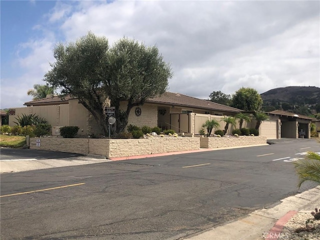 27071 Calle Caballero Unit B, San Juan Capistrano, CA 92675 - view of front of home with fence