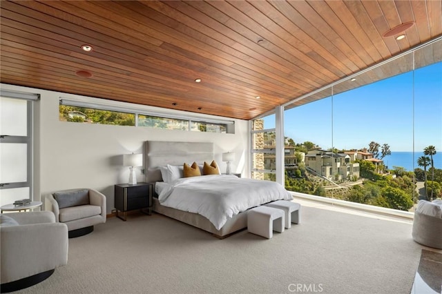856 Diamond, Laguna Beach, CA 92651 - carpeted bedroom featuring wooden ceiling, multiple windows, and floor to ceiling windows