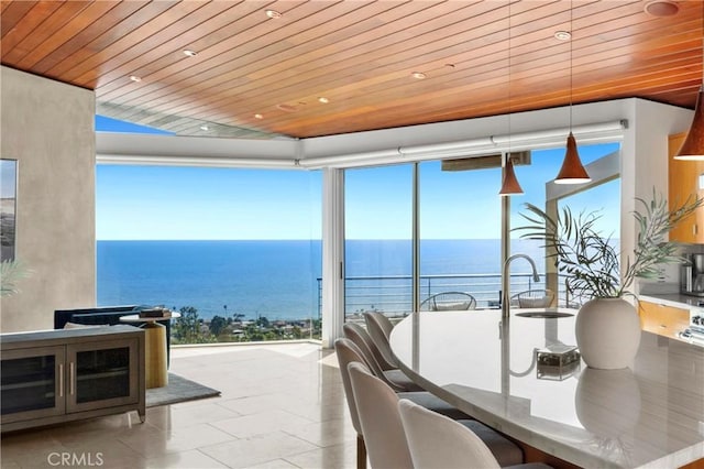 856 Diamond, Laguna Beach, CA 92651 - dining space with wood ceiling, a water view, healthy amount of natural light, and recessed lighting