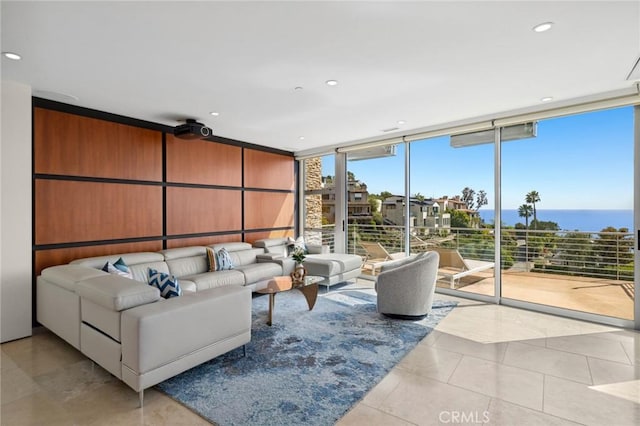 856 Diamond, Laguna Beach, CA 92651 - living area featuring expansive windows, light tile patterned floors, recessed lighting, and a water view