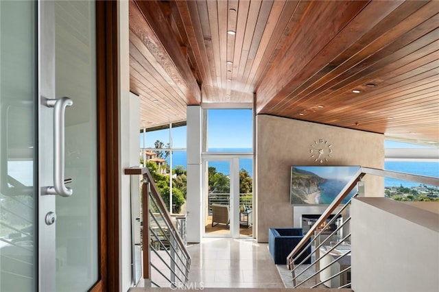 856 Diamond, Laguna Beach, CA 92651 - entryway featuring wood ceiling, healthy amount of natural light, tile patterned floors, and floor to ceiling windows