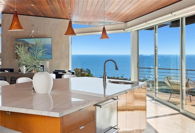 856 Diamond, Laguna Beach, CA 92651 - kitchen featuring a sink, wooden ceiling, a water view, decorative light fixtures, and expansive windows